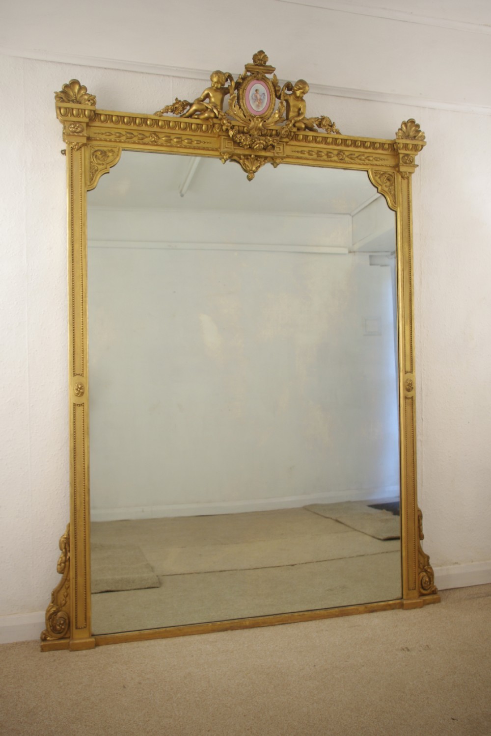 Victorian Gilt Large Overmantle Mirror with 'Putto' Cresting