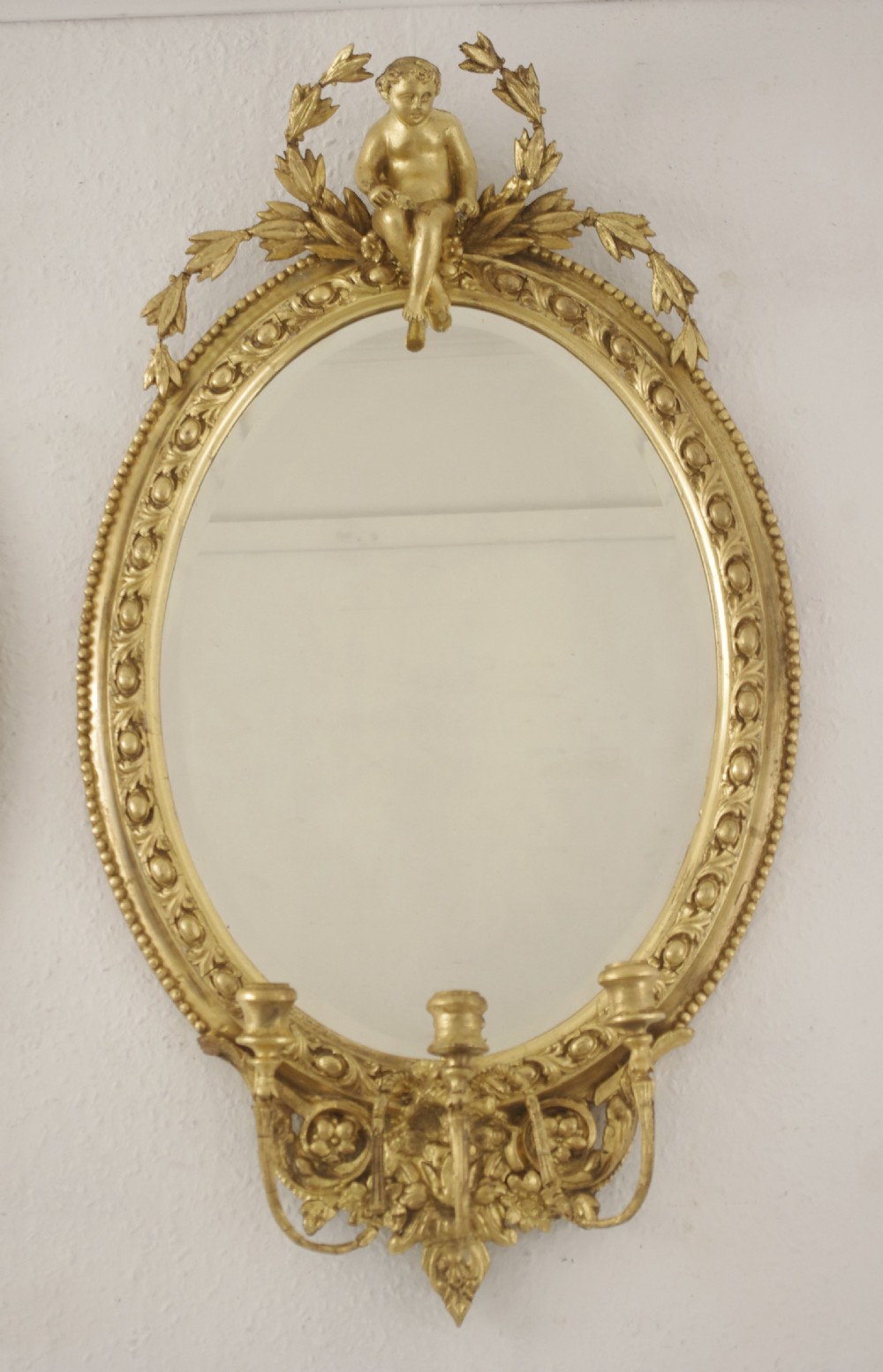 Pair of Victorian Gilt Oval Girandole  Mirrors with Putto Cresting View III