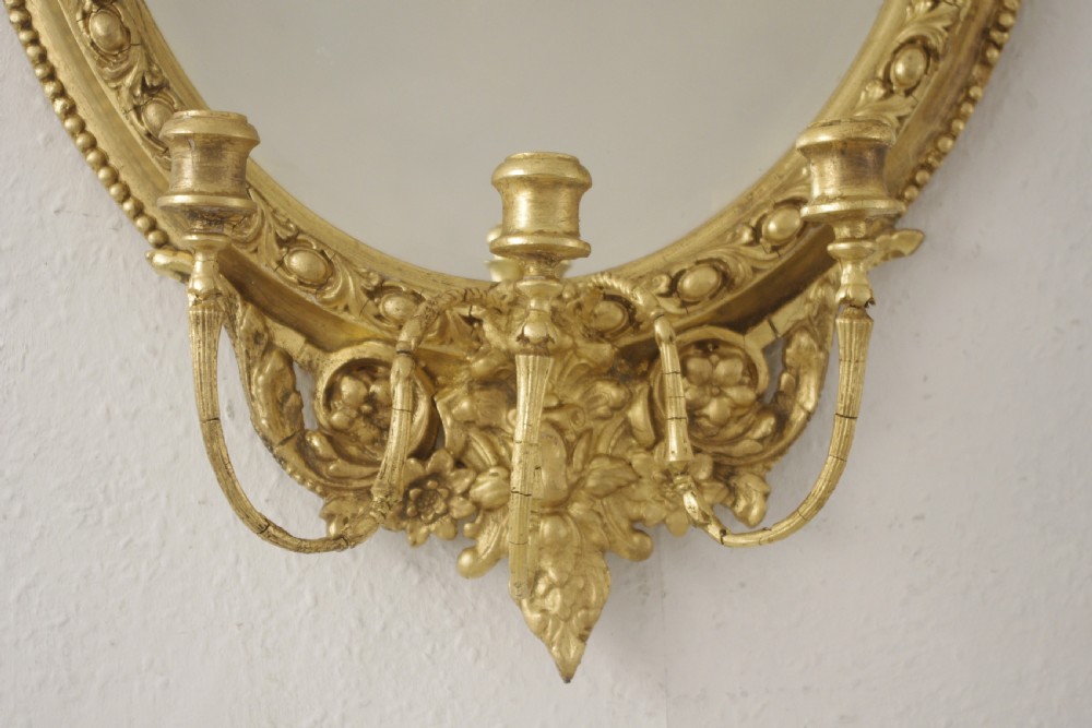 Pair of Victorian Gilt Oval Girandole  Mirrors with Putto Cresting View VII