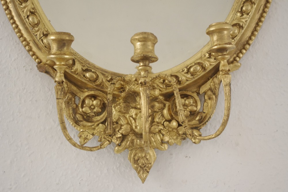 Pair of Victorian Gilt Oval Girandole  Mirrors with Putto Cresting View VIII