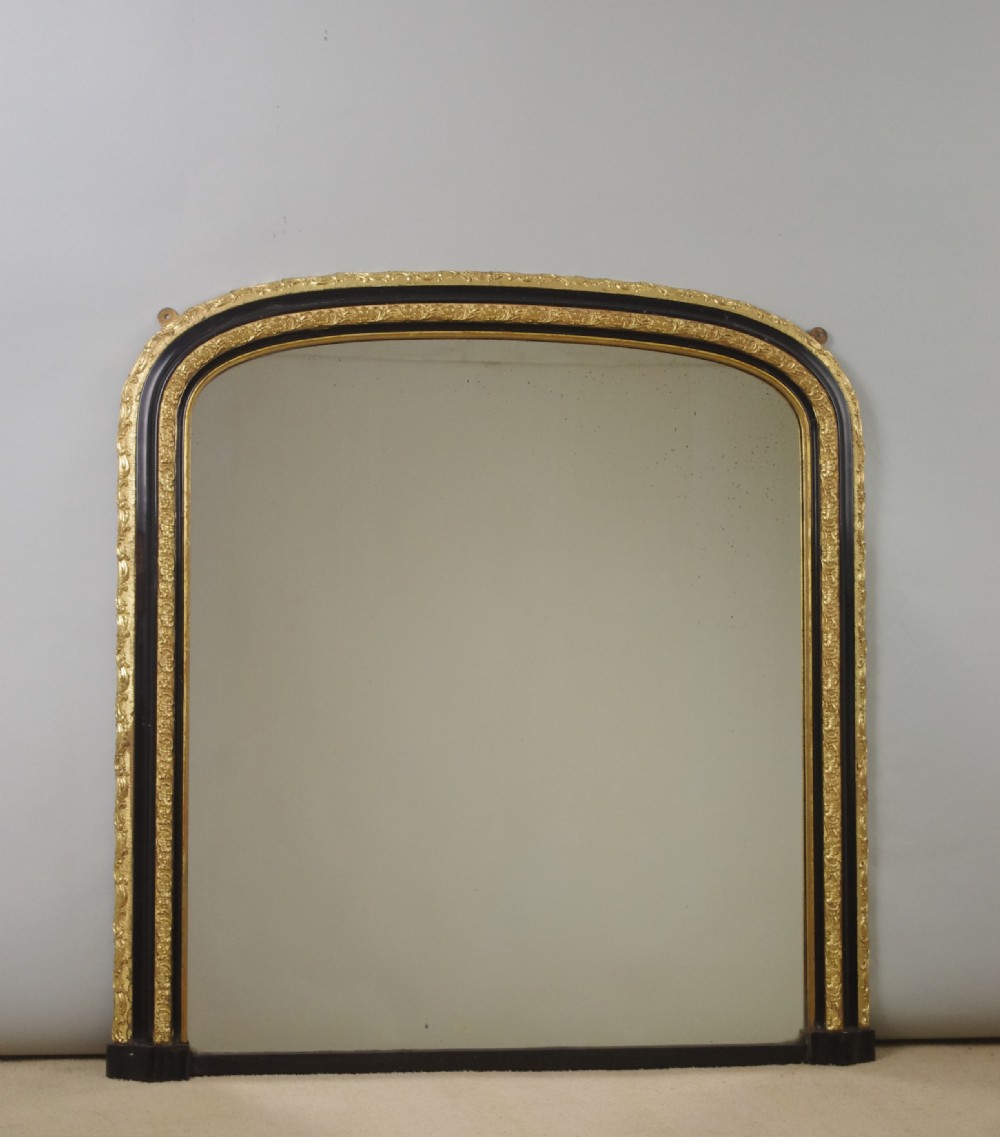 Victorian Ebonised and Parcel-Gilt Arch Top Overmantle Mirror