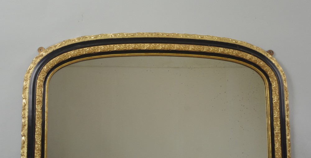 Victorian Ebonised and Parcel-Gilt Arch Top Overmantle Mirror View II