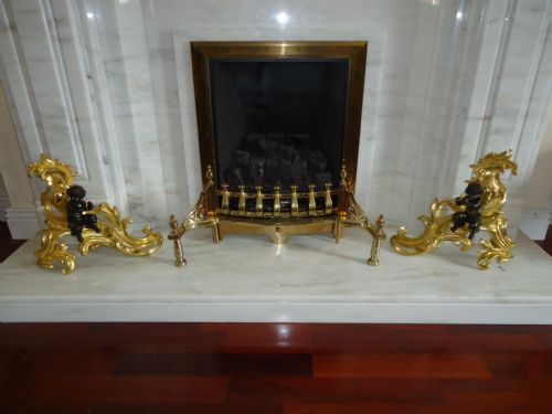 A Fine Pair of Bronze and Gilt Chenet