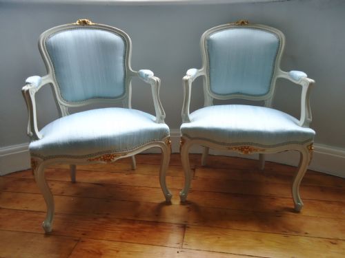 A Superb Pair of French Arm Chairs