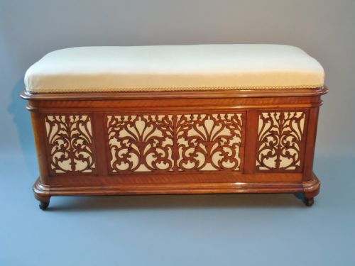 A Walnut Canterburry Stool