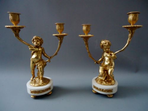 A High Quality Pair of Louis XV Style Ormolu Candlesticks