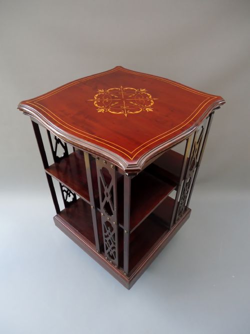 A Serpentine Shaped Mahogany Revolving Bookcase