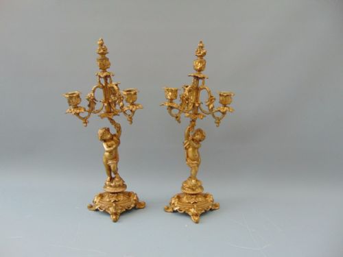 A Pair of  French Cherub Candlesticks Candelabra