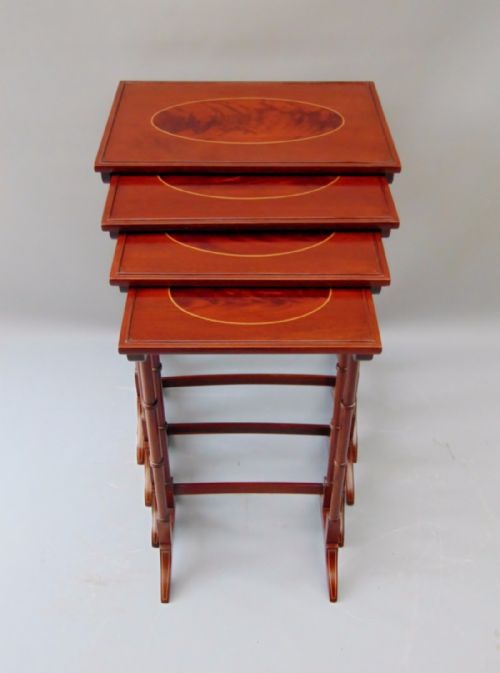 A Nest of Four  Mahogany Tables  Quarteto