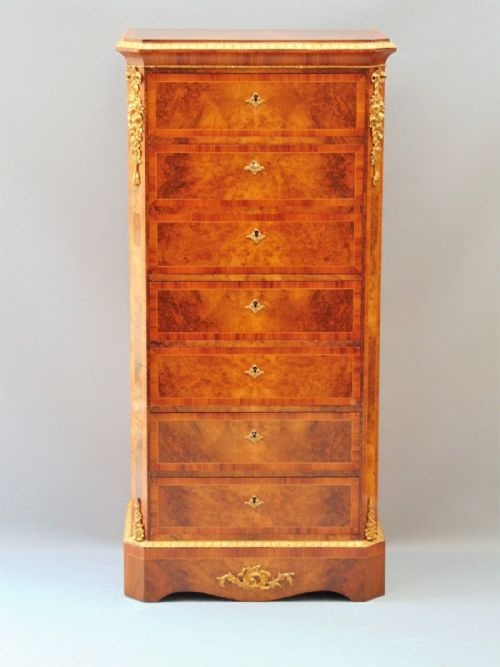A Stunning Walnut Pedestal Wellington Chest of Drawers