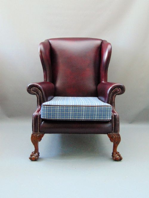 A Leather Wing Back Arm Chair