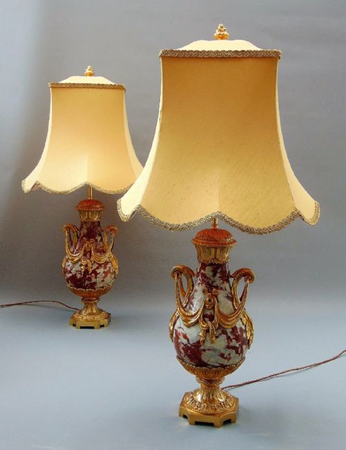 A Superb Pair of Rouge Marble Table Lamps
