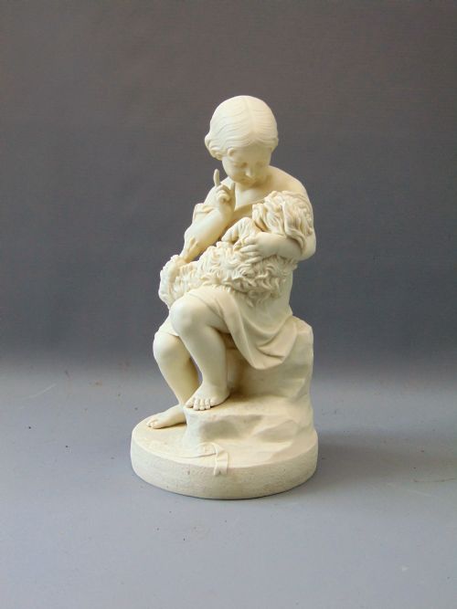 A Large Copeland Parian  Figure of a Girl Holding a Dog