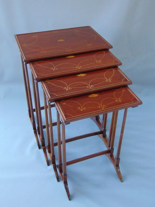A Fabulous Nest of Four Mahogany Tables Quartetto