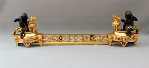 A Ormolu and Bronze  Cherub Chenet Andiron