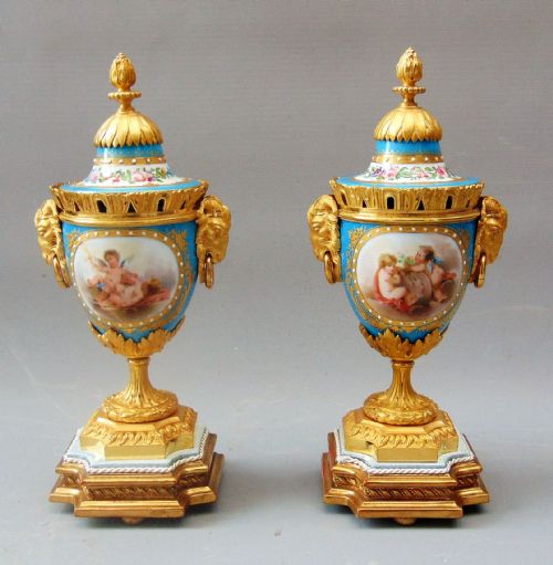 A Superb Pair of Porcelain Vases with Covers