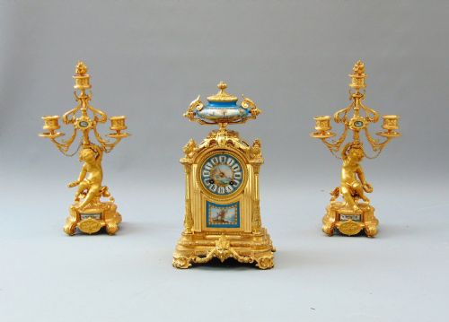 A Fine Ormolu Clock Set