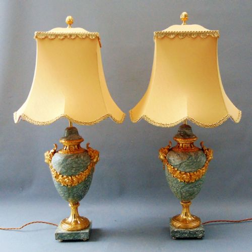 A Stunning Pair of Large Marble and Ormolu Table Lamps