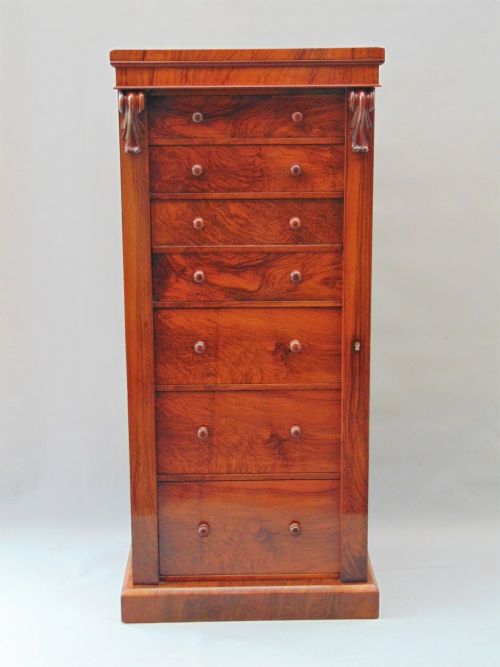A Good Quality Walnut Wellington Chest