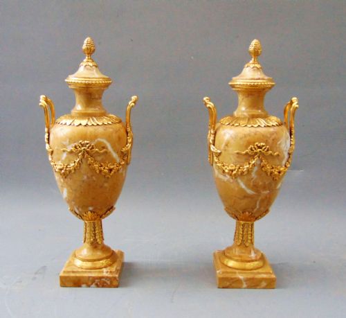 A Elegant Pair of Sienna Marble Cassolettes