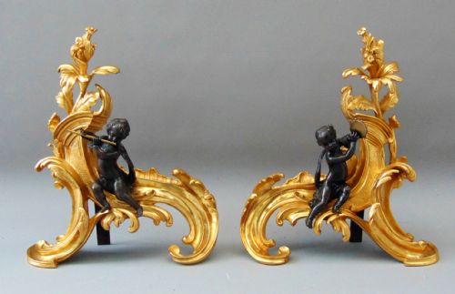 A Pair of Ormolu Cherub Chenets Andirons Fire Irons