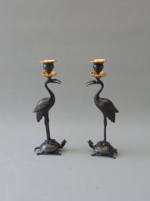 A  Good Pair of  Gilt Bronze Stork Candlesticks