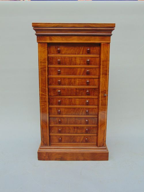 A Rare Miniature Walnut Wellington Collectors Chest