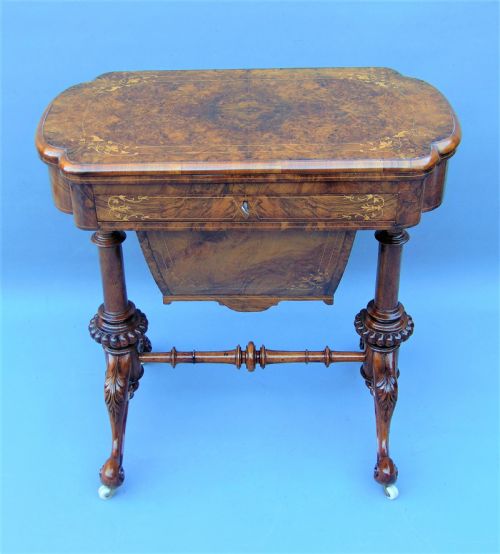 A Fine English Inlaid Burr Walnut Sewing Games Table