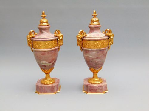 A Fine Pair of Marble Cassolettes