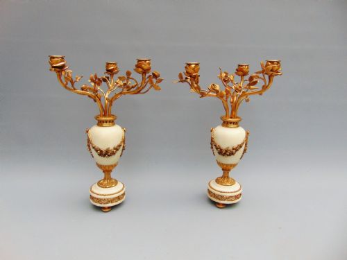 A Fine Pair of Marble Cassolettes