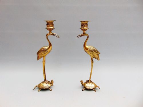 A Pair of Stork Candlesticks