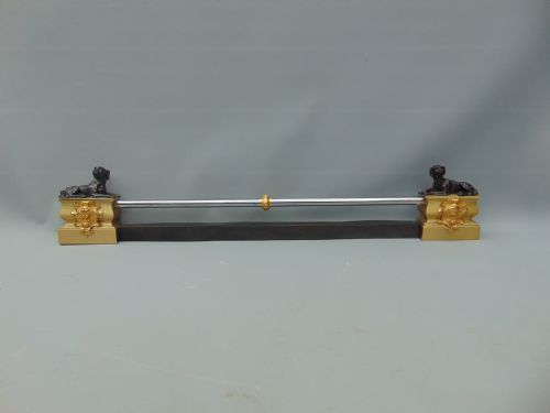 A Bronze and Gilt Fender