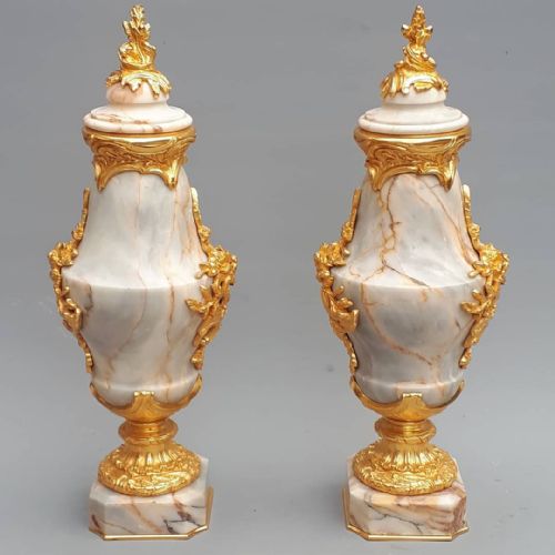 A Fine Pair of Marble Cassolettes