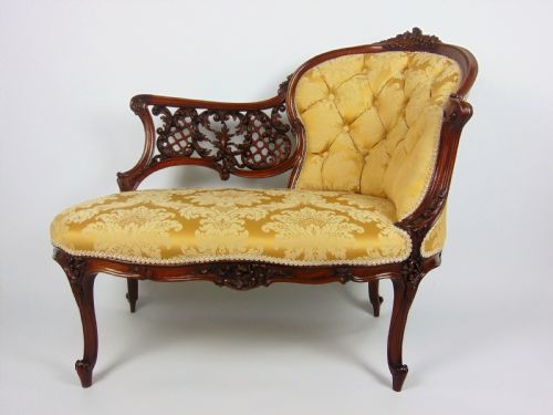 A Superb Walnut Petite Settee