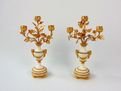 A Fine Pair of Alabastar Candlesticks