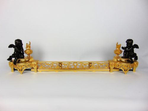 A  Bronze Cherub Chenet Fender