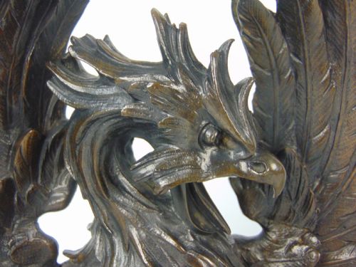 fig 1. A rare pair of phoenix chenet andirons 