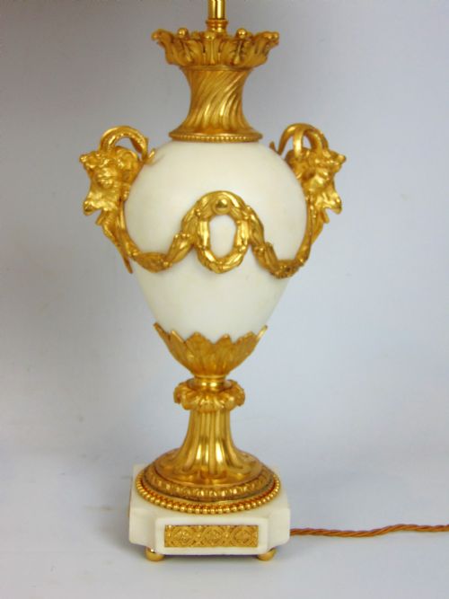 fig 1. A pair of white marble table lamps