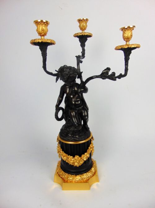 A Large and Good Quality Cherub Bronze Candlestick