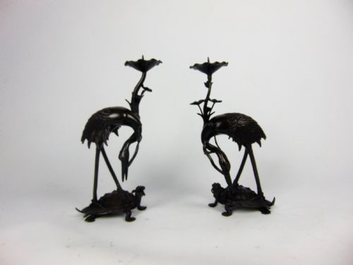 A Pair of Bronze Candlesticks