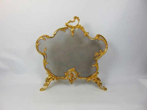 A Fine Gilt Fire Screen