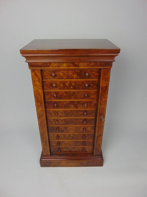 A Rare Miniature Walnut Wellington Chest
