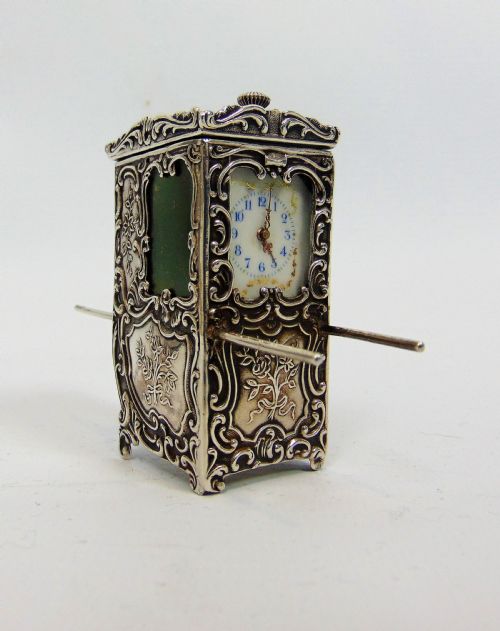 A Superb Silver Miniature Swiss Sedan Clock
