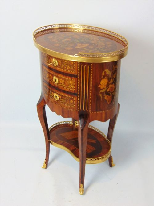 A Superb Marquetry Oval Side Table
