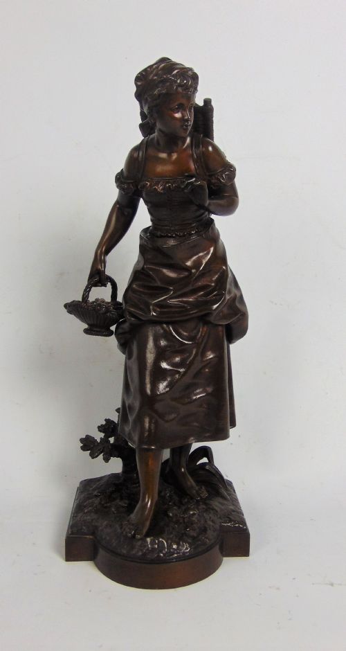 A Large Bronze Bare Footed Girl Collecting Eggs