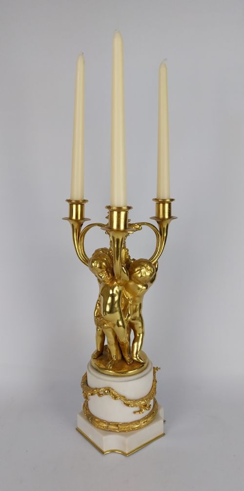fig 1. Gilt Bronze Cherub Candlestick Table Centre