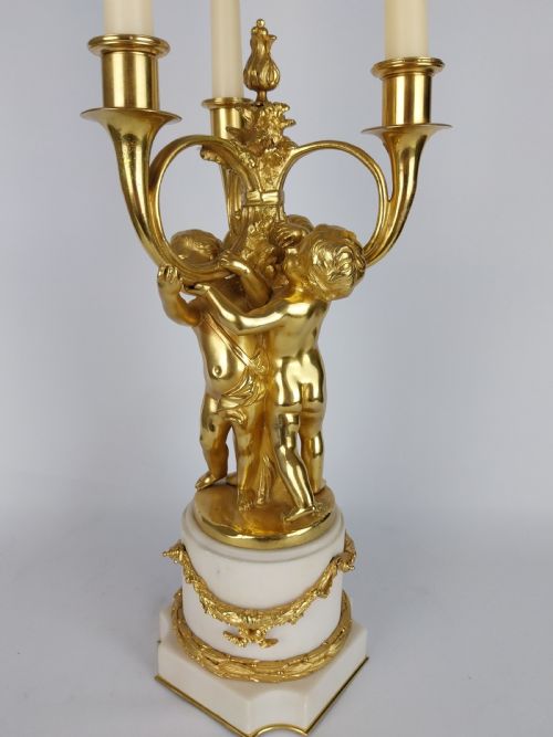 fig 3. Gilt Bronze Cherub Candlestick Table Centre