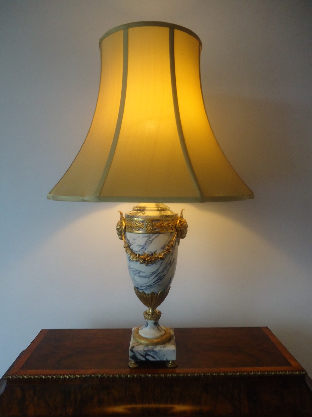 A large grey veined marble lamp