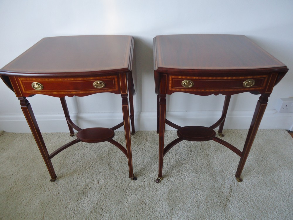 A fabulous pair of mahogany pembroke drop leaf tables