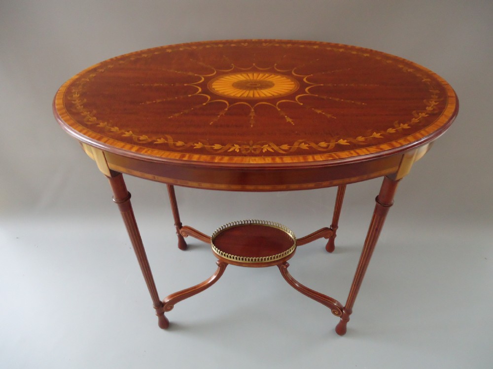A fine inlaid oval occasional / side table